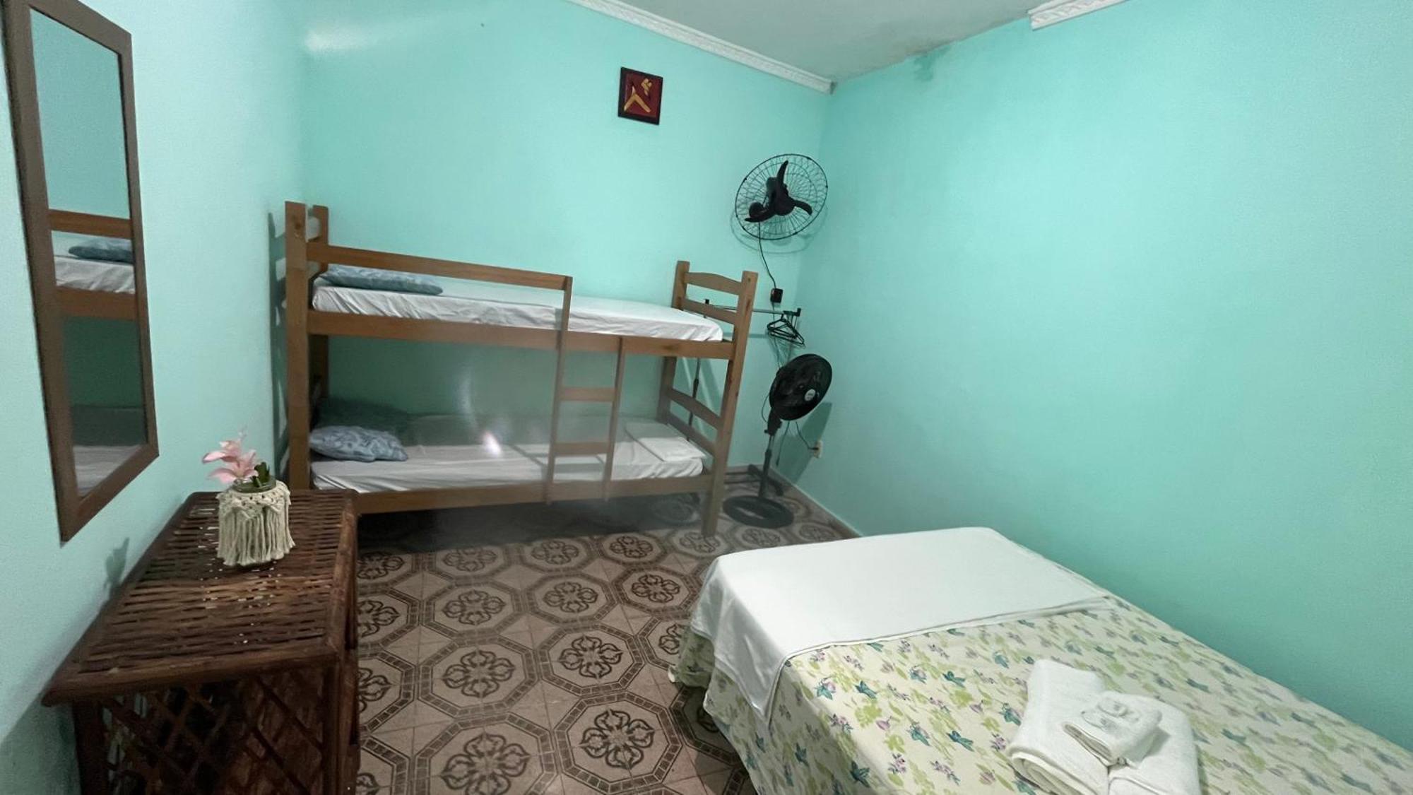 Quarto Quádruplo com Banheiro Compartilhado